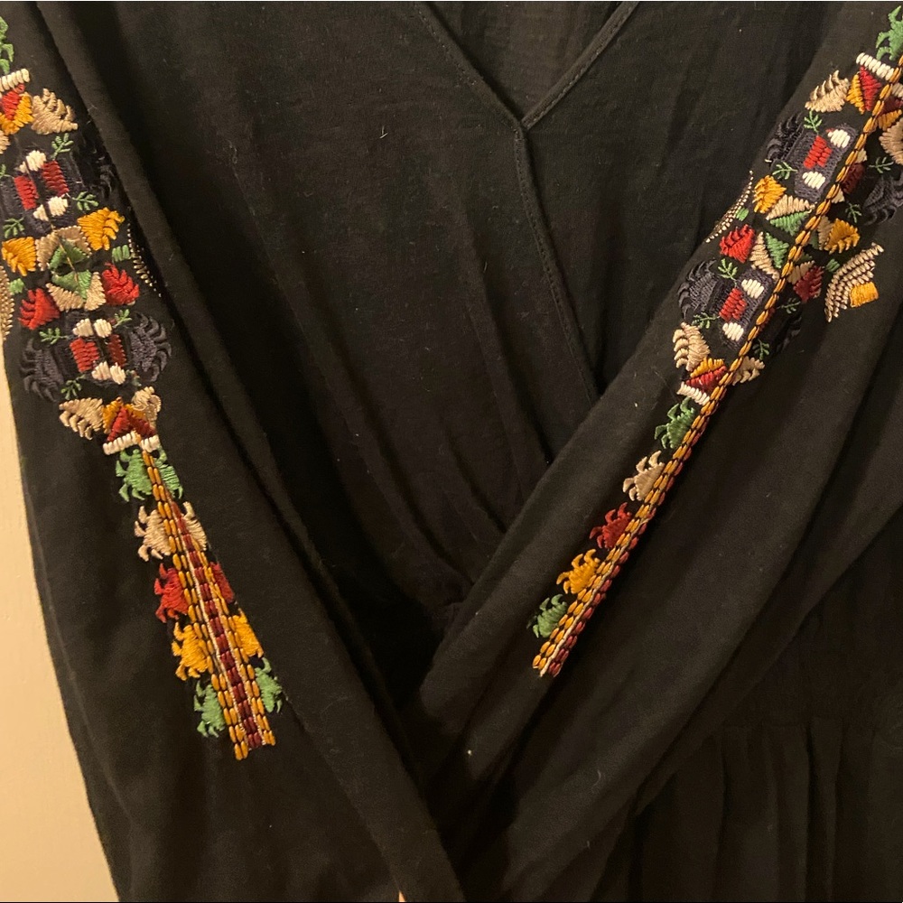 Anthro stitched long-sleeve peplum shirt